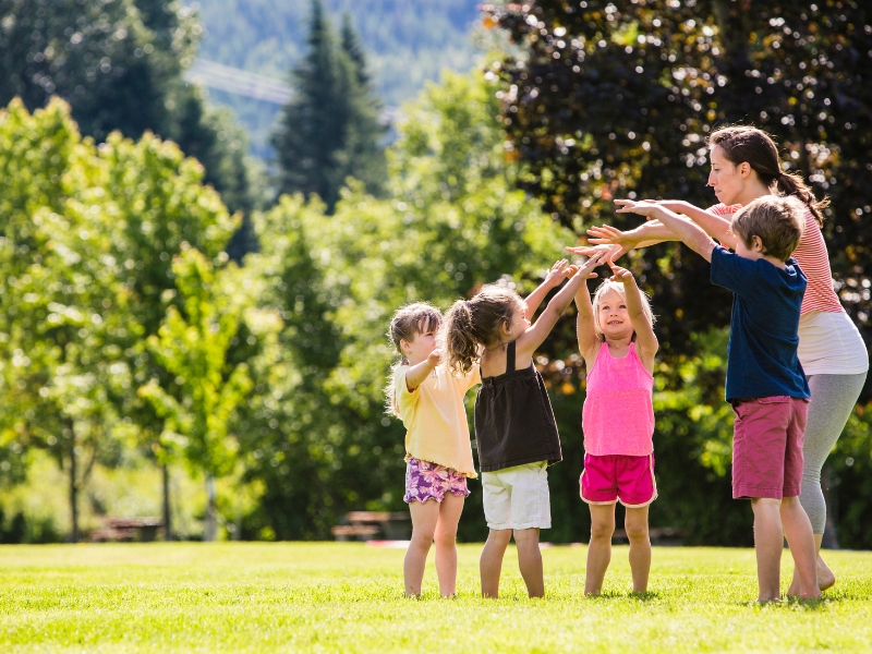 Outdoor daycare games enhance a child's social skills with group play and interaction in a natural environment.