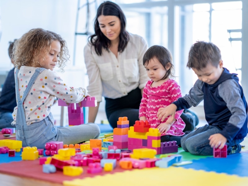 Happy children engaged in various educational activities, including art, science experiments, and group learning. Perfect for educational programs for kids.