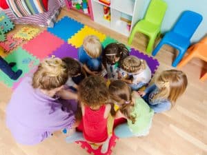 A group of preschoolers engage in cognitive activities, solve puzzles, and play memory games to enhance their early learning skills.